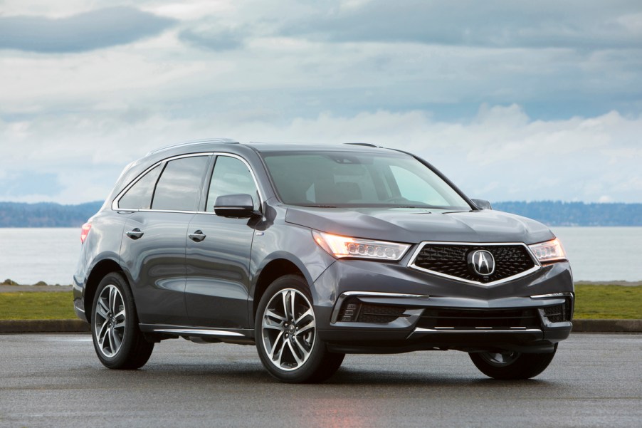 2019 Acura MDX Sport Hybrid parled on pavement