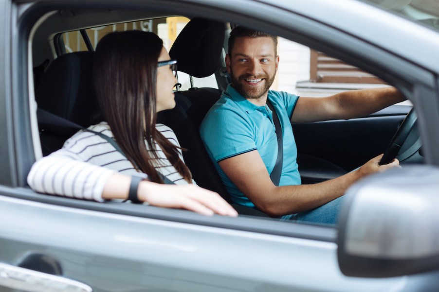 Driver and passenger discuss car etiquette rules