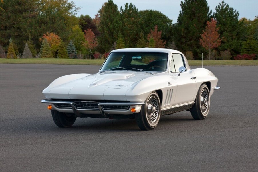 A white 1966 Chevy Corvette shows off its post-C1 C2 front-end styling.