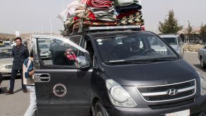 Rooftop cargo holder