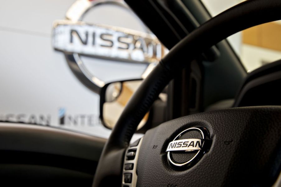 A picture from the inside of a Nissan Titan showing the steering wheel.