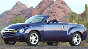 A blue 2003 Chevrolet SSR in the mountains.