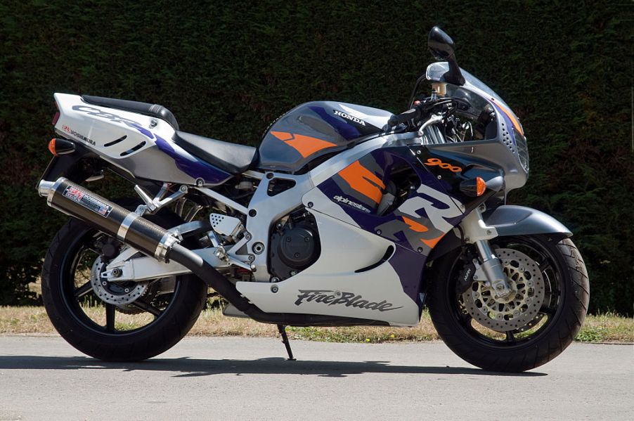 A Honda Fireblade motorcycle parked on the street.