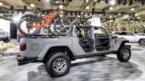 A Jeep Gladiator XMT on display at an auto show.