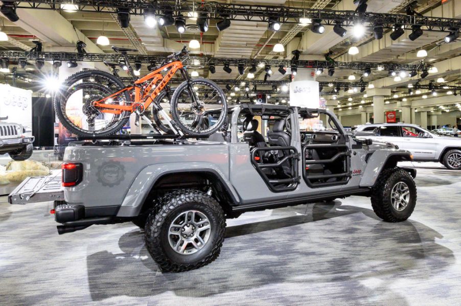 A Jeep Gladiator XMT on display at an auto show.