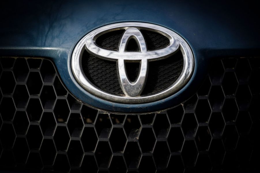 Toyota's logo on the front of a truck.