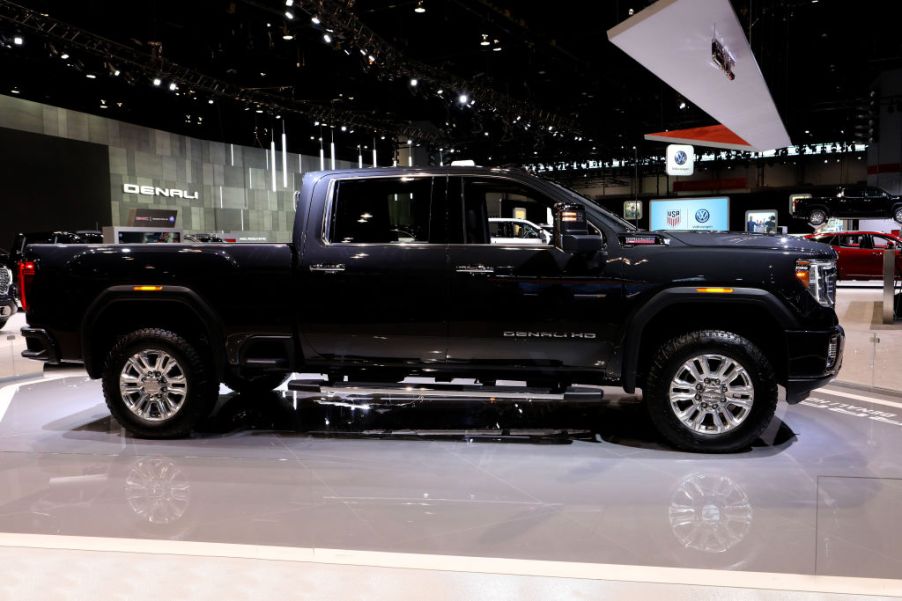 A 2020 GMC Sierra HD on display at an auto show.