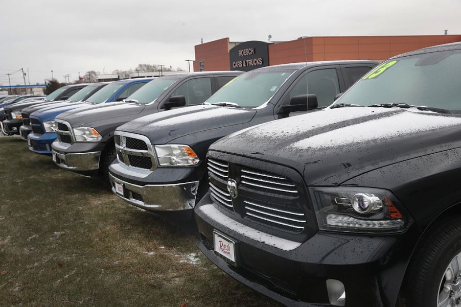 Ram 1500 diesel trucks for sale at a car lot.