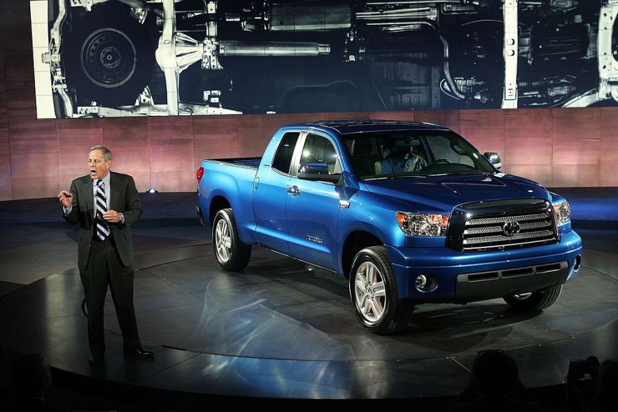 A Toyota Tundra being unveiled at an auto show.