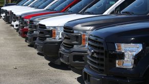 Used pickup trucks for sale on a dealership lot