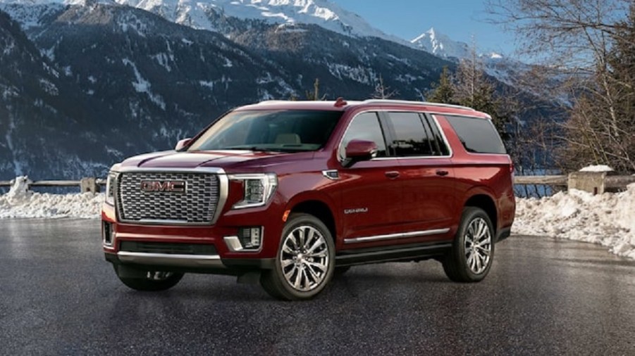 2021 GMC Yukon XL Denali parked on snowy mountain top