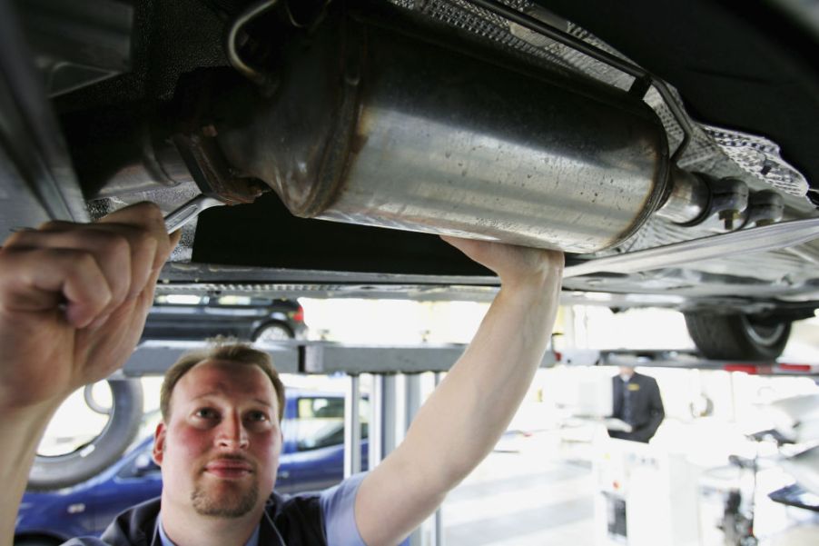 A car mechanic working on a car