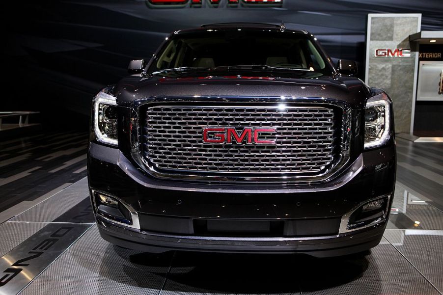 A 2015 GMC Yukon on display at an auto show