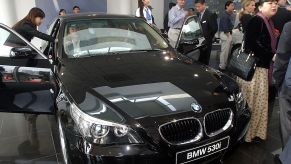 Potential car buyers checking out a BMW car