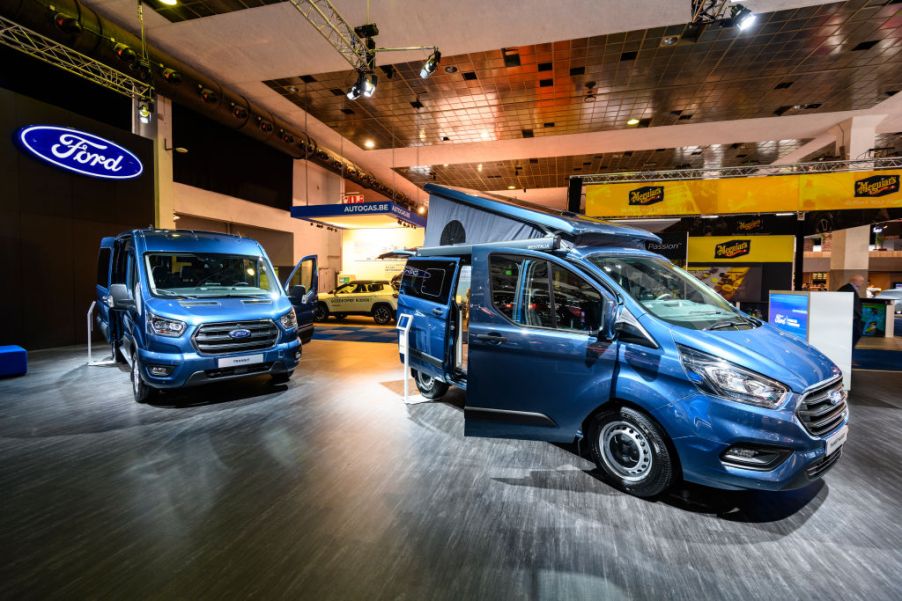 Ford Transit vans on display at an auto show