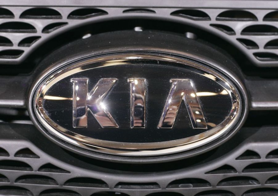 A Kia logo shown on the front of a car