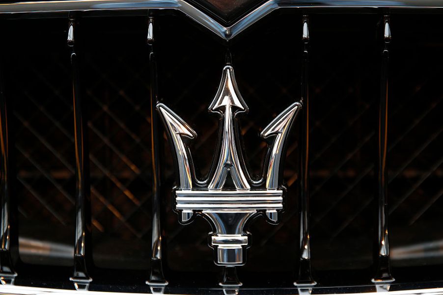 The Maserati logo on the front of a car