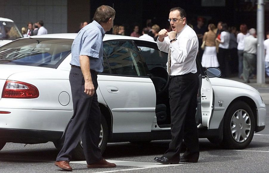 Two drivers fight after a disagreement behind the wheel