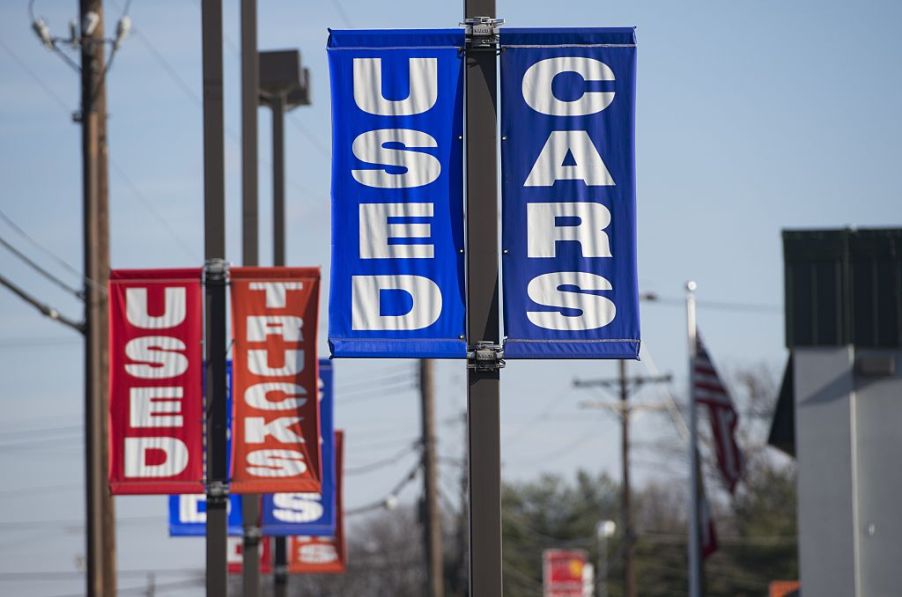 A sign for a used car dealership