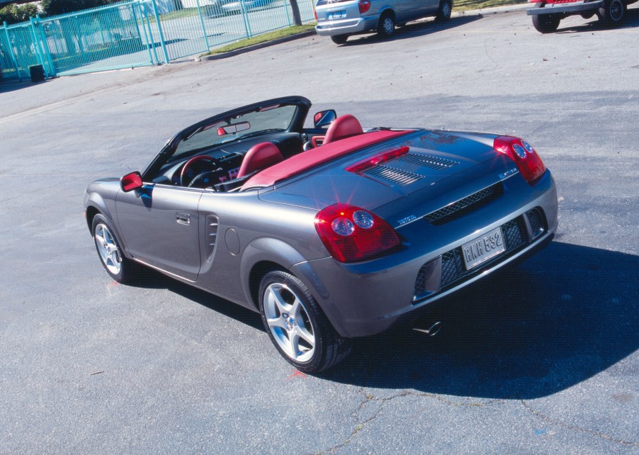 A silver 2004 Toyota is parked in a parking lot.