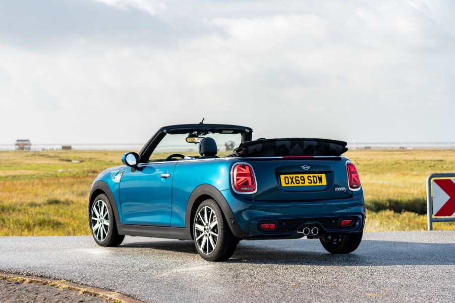 Mini Cooper Convertible parked near a beach