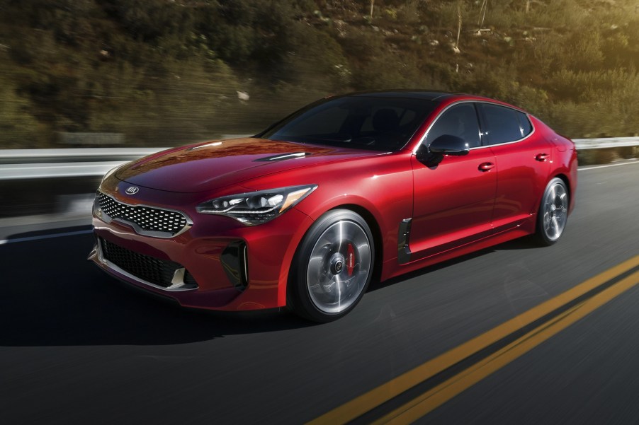 A red 2020 Kia Stinger on the track.