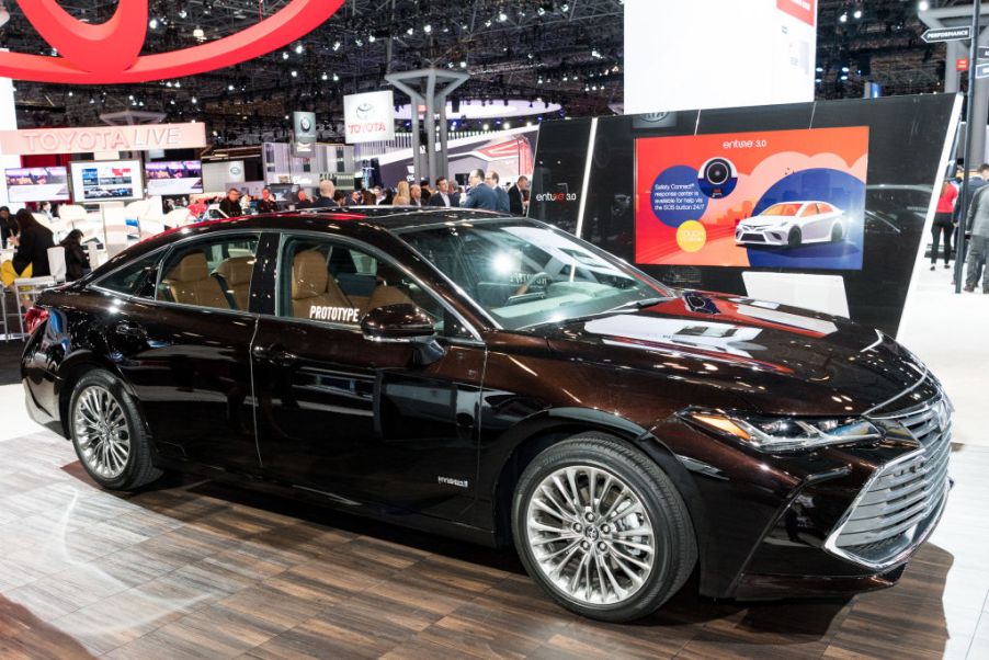 A black Toyota Avalon on display at an auto show