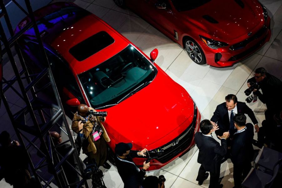 Honda executives celebrate as the 2018 Honda Accord is named the car of the year at the 2018 North American International Auto Show