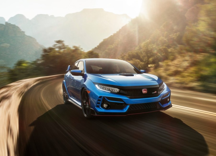 Blue 2020 Honda Civic Type R driving around a corner