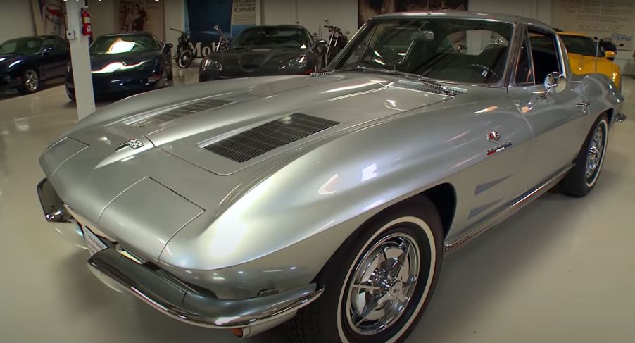 A silver 1963 Corvette Sting Ray Split-Window Coupe in a garage