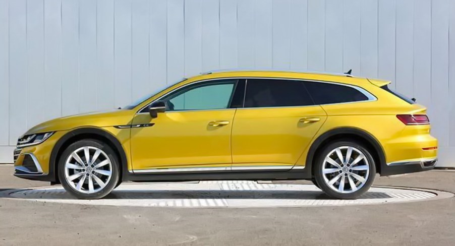 Yellow 2021 VW Arteon Shooting Brake wagon side view