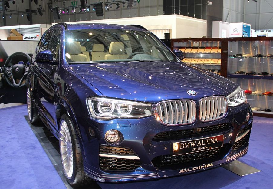 A BMW Alpina SUV on display at an auto show