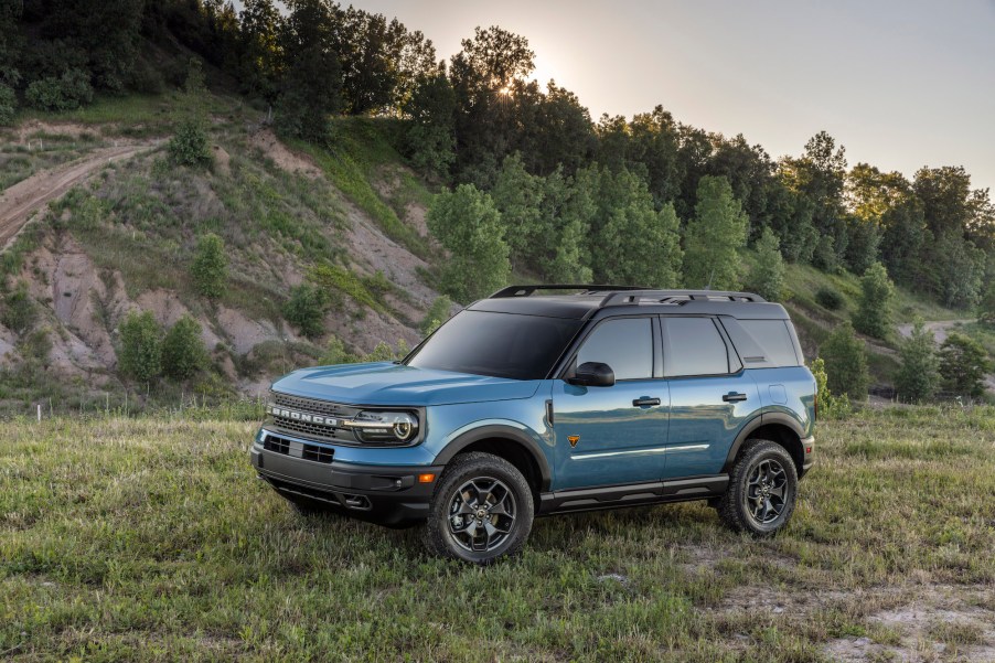 a blue Bronco Sport unibody SUV in the wilderness