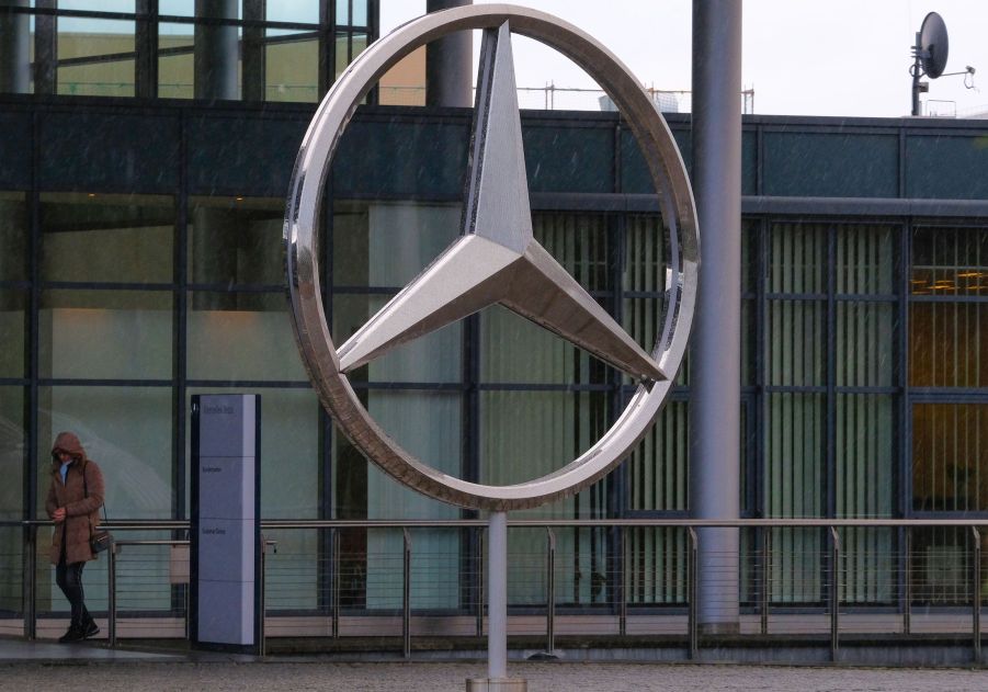 A Mercedes-Benz three-pointed star emblem is pictured on January 29, 2020 outside a factory