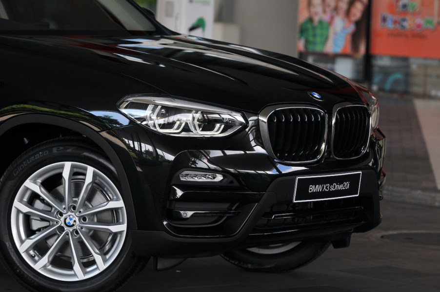 A look at a black BMW X3's front grille, a direct competitor to the Audi Q5