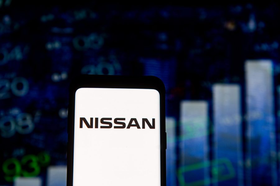 A Nissan logo displayed on a phone screen