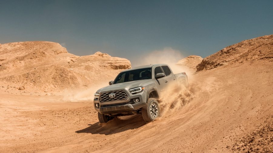 Toyota Tacoma blazing through the sand