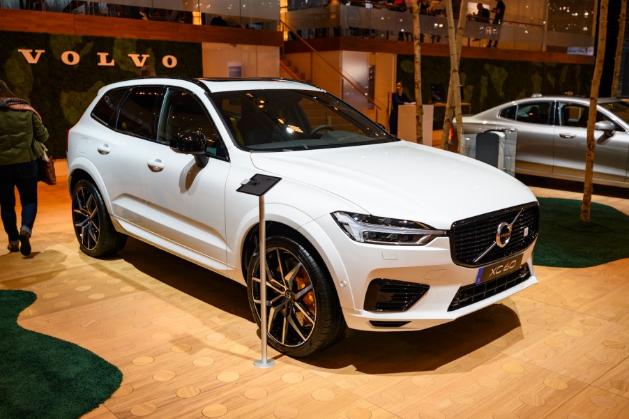 A white 2020 XC60 crossover SUV car on display at Brussels Expo