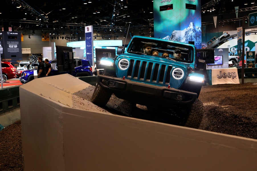 A 2020 Jeep Wrangler Rubicon makes its way through the 'Jeep Experience Articulation' exhibition at the 112th Annual Chicago Auto Show