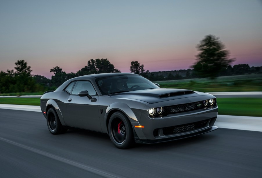 Dodge Challenger SRT Demon driving at sunset