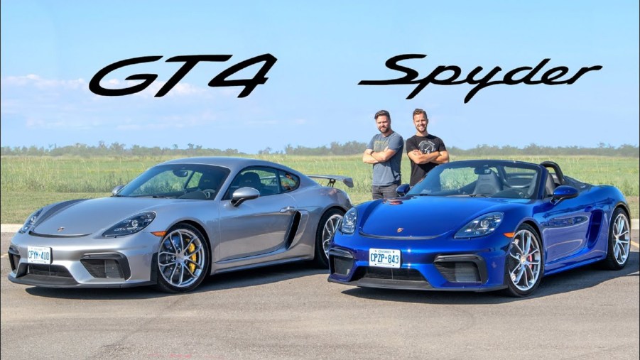 A silver-gray 2020 Porsche 718 Cayman GT4 next to a blue 2020 Porsche 718 Spyder