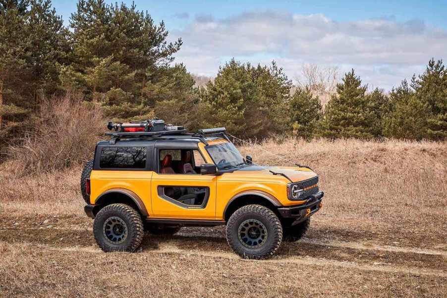 2021 Ford Bronco driving through mud and dirt