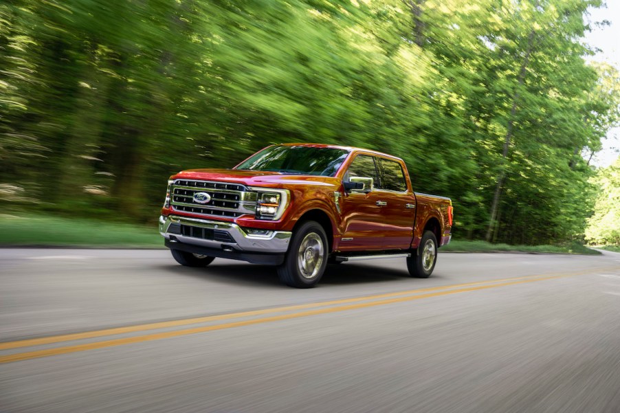 2021 Ford F-150 driving through a forest