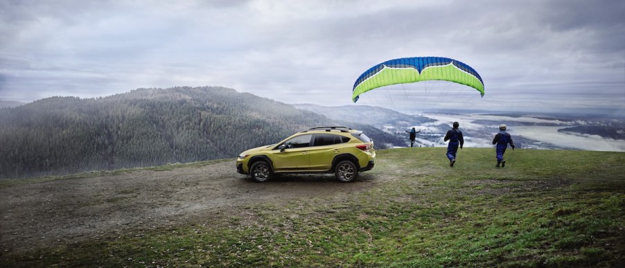 2021 Subaru Crosstrek with a parachute and two people ready to fly