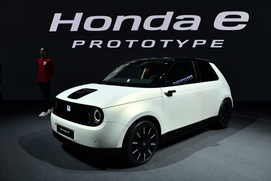 A Honda e prototype on display at an auto show