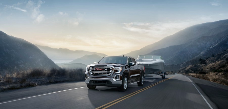 2020 GMC Sierra SLT towing a boat