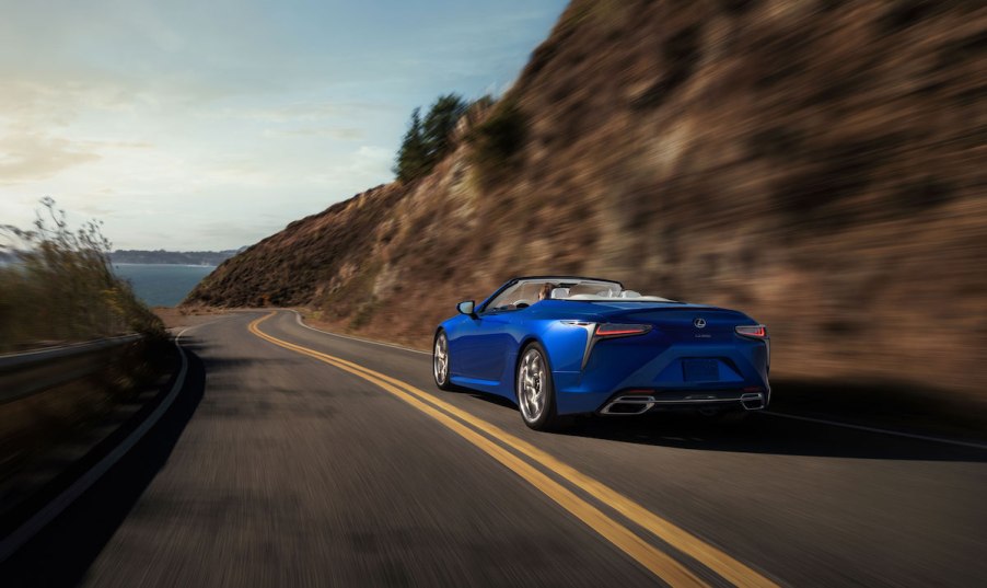 2021 Lexus LC 500 Convertible speeding around a mountainous road