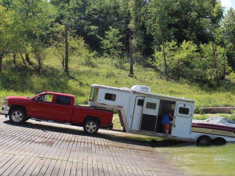 The boat and camper RV trailer at the boat launch.