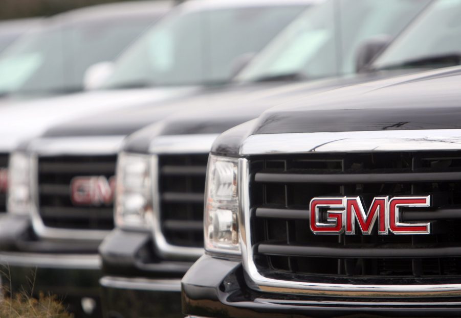 GMC Sierra trucks on display at a dealership