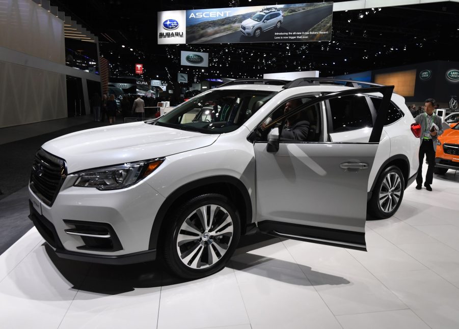 A white Subaru Ascent on display at an auto show